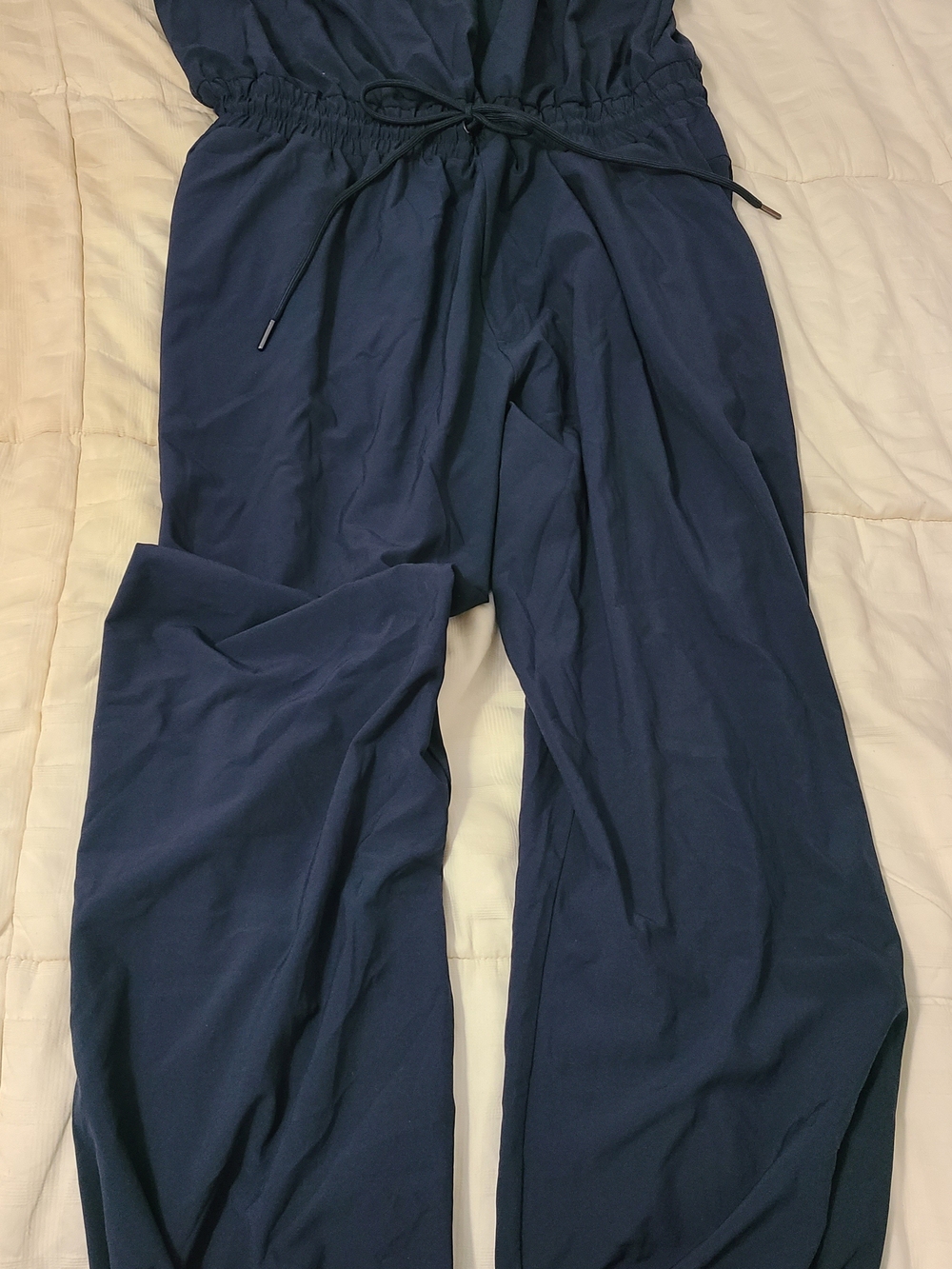 Abercrombie & Fitch navy sleeveless, wide-leg jumpsuit with a drawstring waist.